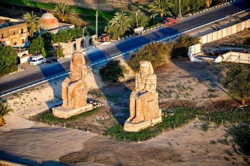 Visit the iconic Colossi of Memnon at sunrise as part of your Egypt to Jordan tour.